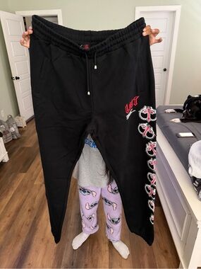 Black Graphic Jogger Sweatpants with Red Accent